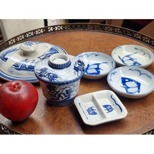 435 - A neat sized box filled with approximately thirty Japanese and Chinese porcelain and ceramic pieces.... 