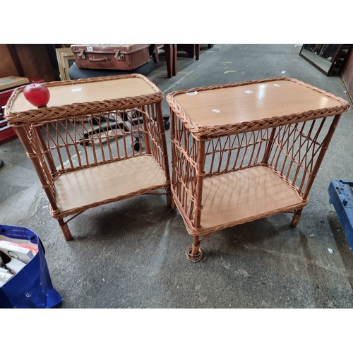 951 - A pair of brand new wicker end tables. Both matching two tier examples with enclosed sides. New from... 