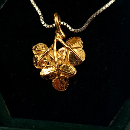 8 - Two boxed hammered gilded silver leaf figure pendant and chain by Irish Shamrock designs. Each stamp... 