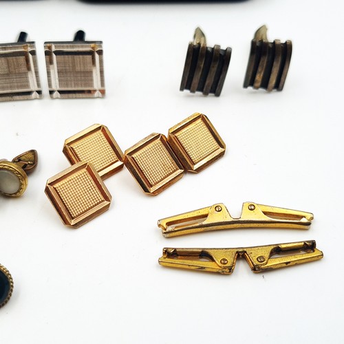 14 - A collection of 10 assorted pairs of cuff links, comprising of vintage and modern items. Mostly with... 