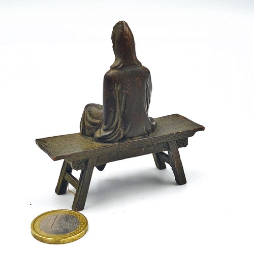 10 - Star Lot : A heavy bronze antique figure of the goddess Guanyin, featuring a serene depiction of the... 