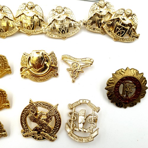 44 - A collection of mostly  army badges Over 20 badges.