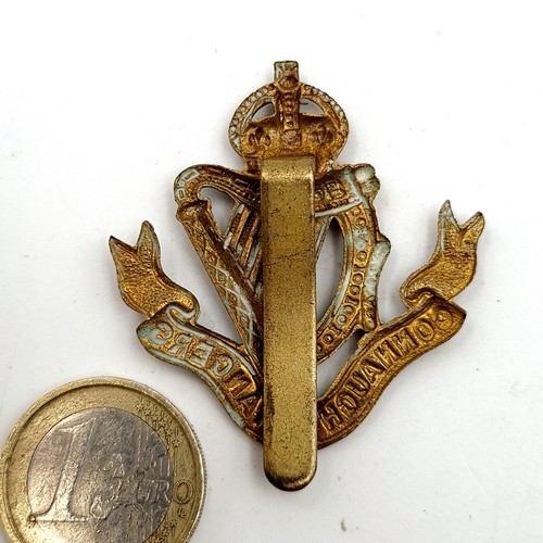 48 - A original antique Irish cap badge for the Connaught Rangers. Dimensions: 5cm x 4cm. Weight: 10 gram... 