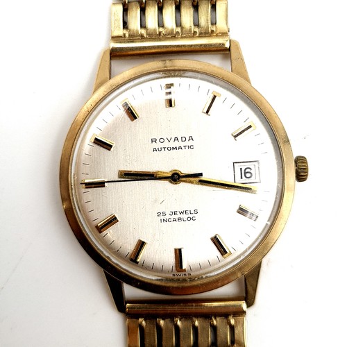 52 - Star Lot: A Rovada 9 carat gold automatic 25 jewelled incabloc wrist watch, featuring a baton dial, ... 