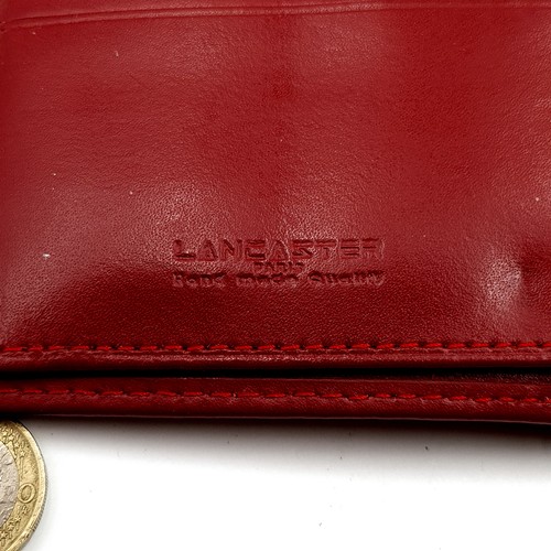 53 - An as new designer fully leather Lancaster leather purse and wallet. Dimensions: 14.5cm x 11cm. Reta... 