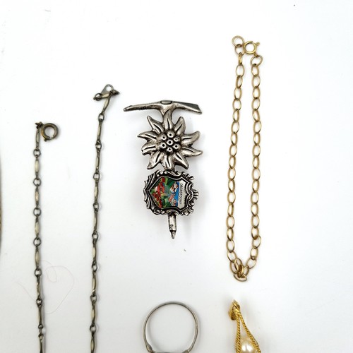 55 - A collection of vintage  jewellery, comprising of necklaces, brooches, pendants and earrings.