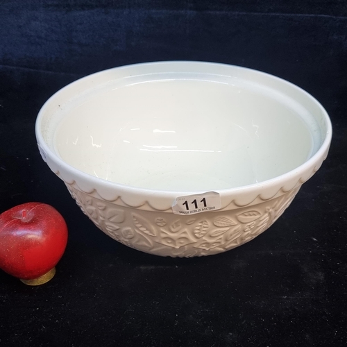 111 - A large Mason Cash mixing bowl. The distinct patterned exterior and rim is designed to help bakers g... 
