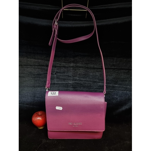122 - A gorgeous Red Cuckoo fold over cross body bag in purple. Contains two compartments separated by zip... 
