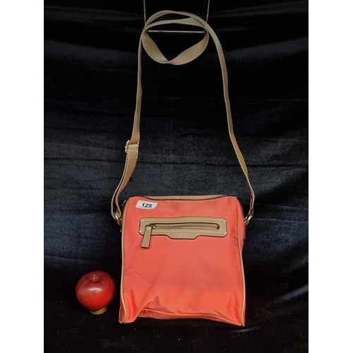125 - A genuine Radley London shoulder bag with zip pocket to front and additional zip pocket to interior.