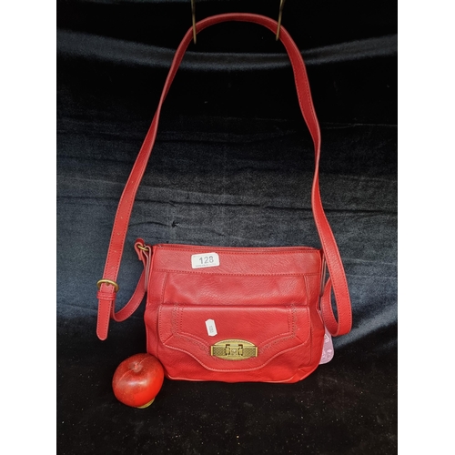 128 - A brand new stylish NICA Koper crossbag in a lipstick red. Additional pocket to front and internal z... 