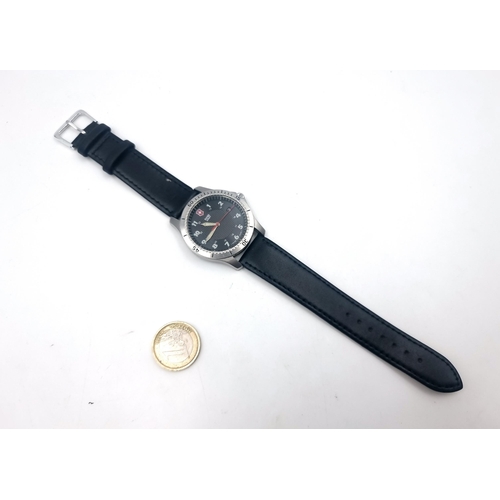 13 - A good quality Swiss Army Brand wrist watch, featuring luminous hands, sweep second hand and date ju... 