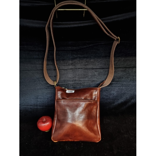 130 - A fabulous Italian handmade Tuscany Leather ladies crossbag. With zip pockets to front and back. Alo... 