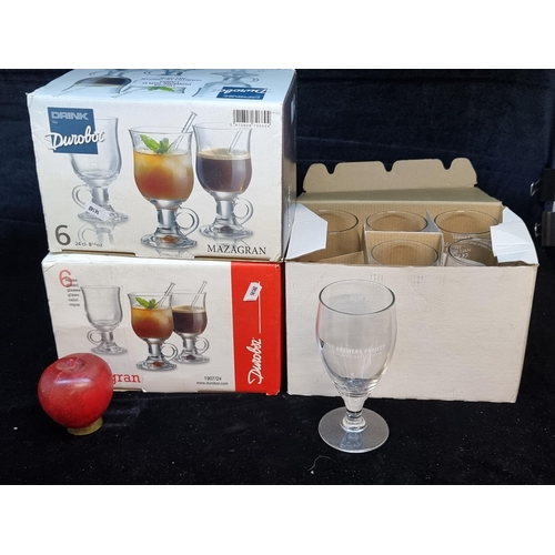 141 - Three brand new boxes of commercial glasses. including twelve hot whiskey / port glasses and six ''T... 