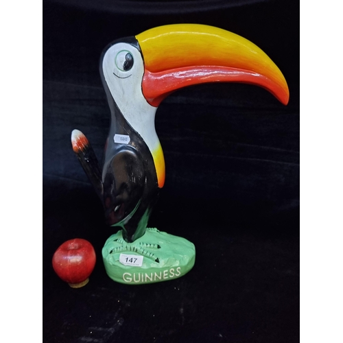 147 - A large Guinness toucan advertising figure. Hand-painted with a mint green base and Guinness brandin... 
