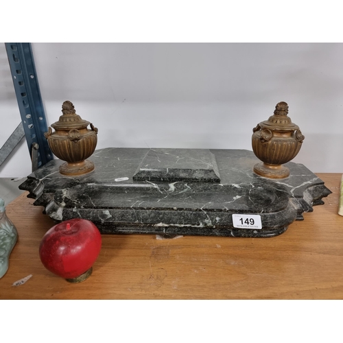 149 - A large victorian  carved marble writing set with large urn inkwells and bun feet.