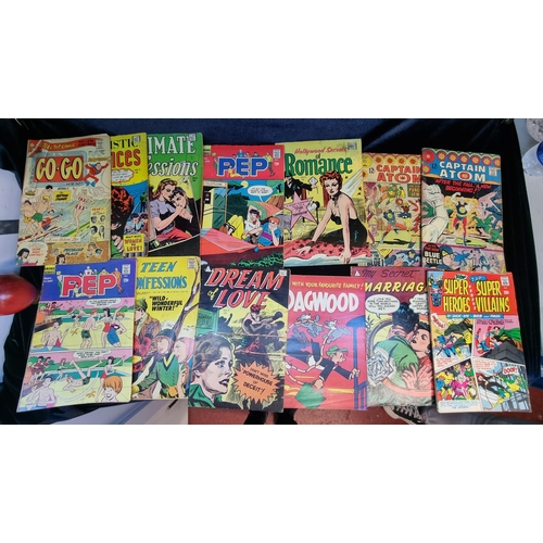 157 - A selection of twelve vintage comics including titles such as Captain Atom, PEP for Archie comics an... 