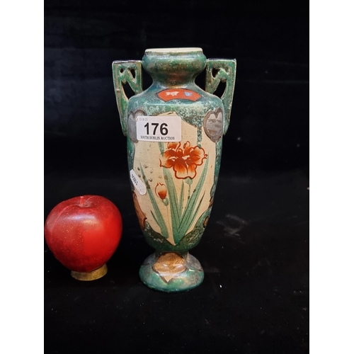 176 - A lovely vintage ceramic vase of Japanese origin. Handpainted with scenes of women and children pera... 