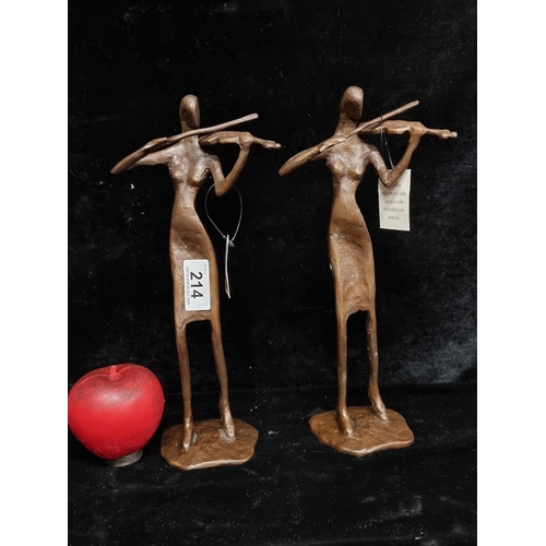 214 - A pair of abstract bronze  violinist figures from House of Bronze.