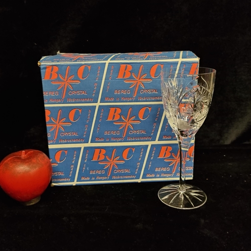 245 - A set of Bereg Crystal stemmed wine glasses in original box. In very good condition.