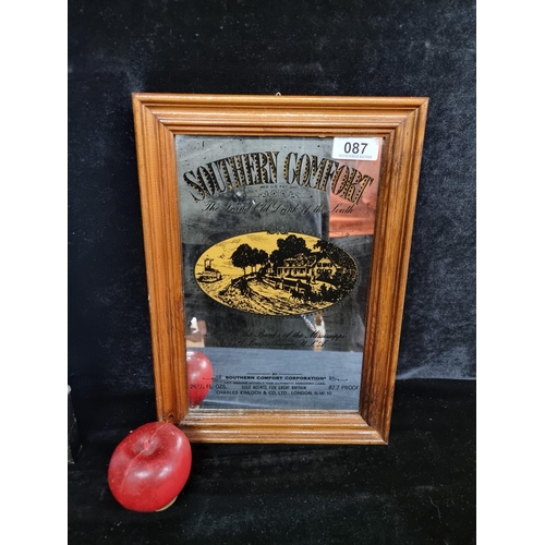 87 - A vintage bar mirror advertising Southern Comfort, made on the banks of the Mississippi. Housed in a... 