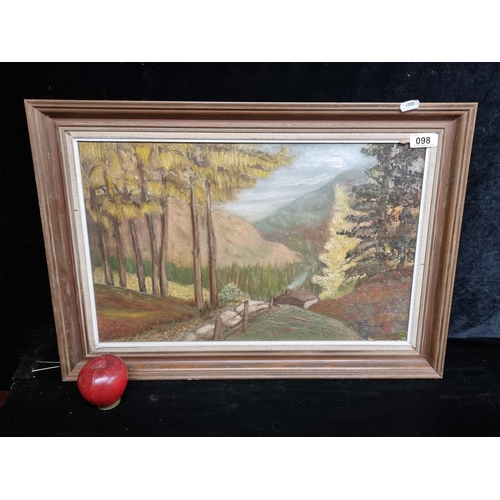 98 - A vintage original oil on board painting showing a forested valley in a palette of autumnal tones. S... 