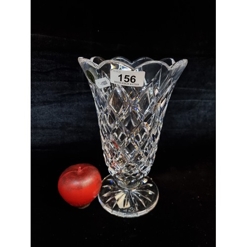 156 - A cut crystal trumpet footed vase by Waterford Crystal. With scalloped rim and diamond quilt pattern... 