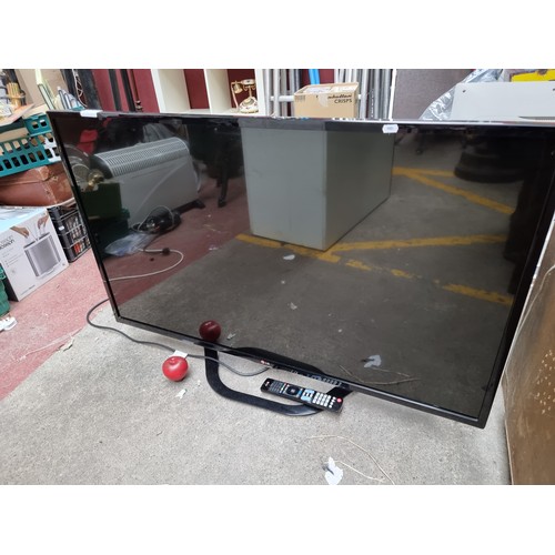 210 - An LG TV 50 inch screen model number: 50LN575V. Remote included.