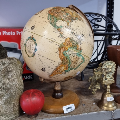 860 - A Replogle 9 inch diameter world globe with a brass Durham Sanctuary wall mounting bell.