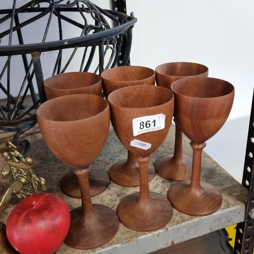 861 - A set of six turned wood stemmed goblets. Designed with elegant silhouettes and an attractive wood g... 