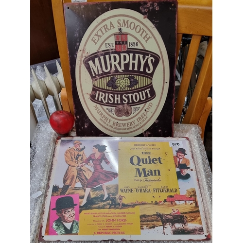 870 - Two cast metal signs of Irish interest including a Murphy's stout advertising sign and a poster for ... 