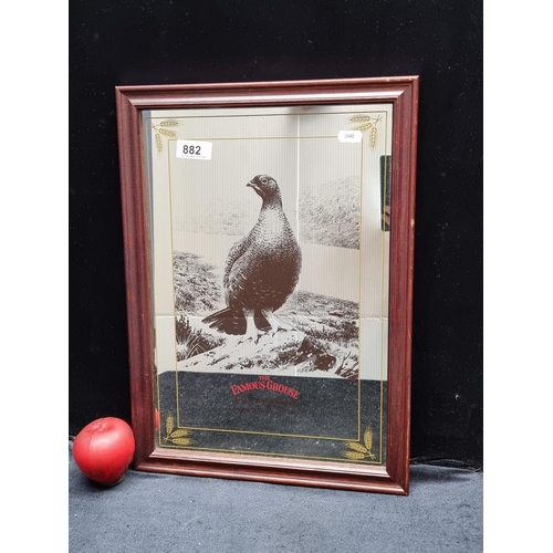 882 - A breweriana advertising mirror for The Famous Grouse Finest Scotch Whisky. Featuring grouse motif a... 