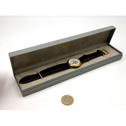 915 - A wrist watch from Alfex of Switzerland with a dial featuring a jumping horse, leather straps and go... 