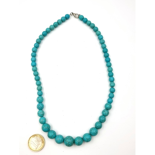 916 - A lovely graduated natural Turquoise beaded necklace, featuring cold to touch stones. Set with lobst... 