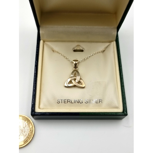 918 - A Solvar branded sterling silver necklace and pendant in the form of a triquetra / trinity knot. Acc... 