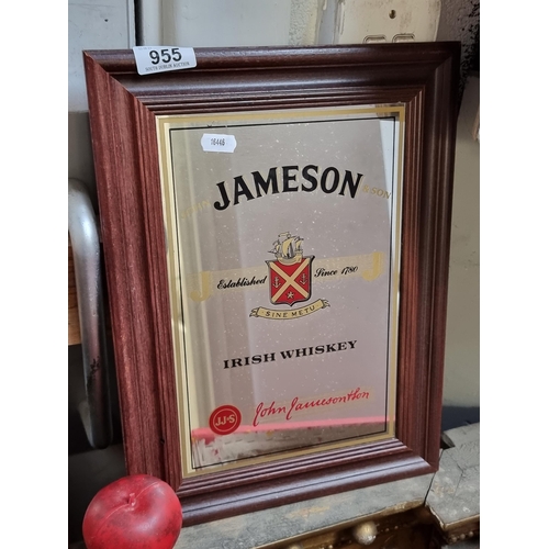 955 - An original advertising mirror for Jameson Irish Whiskey. Housed in  a wooden frame. H39cm x W28cm