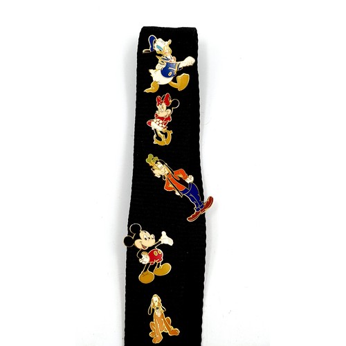 5 - A super cool Disney of Paris pin trading lanyard, featuring mickey mouse to centre and seven Disney ... 