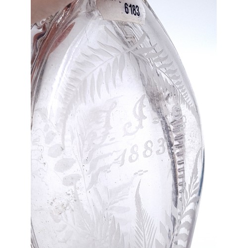 9 - An unusual Irish glass antique dual necked glass perfume flask decanter. Featuring acid etching leaf... 