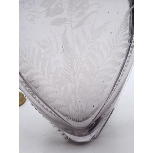 9 - An unusual Irish glass antique dual necked glass perfume flask decanter. Featuring acid etching leaf... 