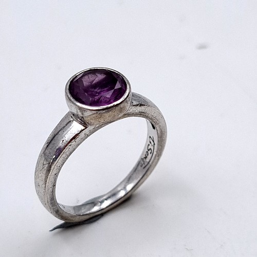 35 - A collection of two sterling silver Amethyst rings, both ring sizes: P. Total weight of rings: 11.43... 