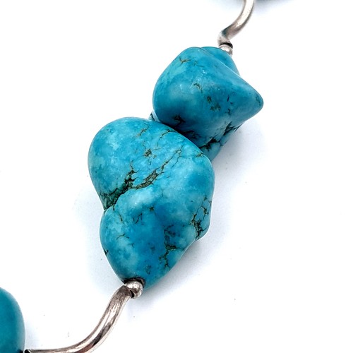 46 - A fabulous and heavy natural formed Turquoise stone necklace, featuring lovely sterling silver ribbe... 