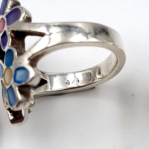 54 - Two sterling silver rings, including a Mother of Pearl set example. Ring size: L. Weight: 6.48 grams... 