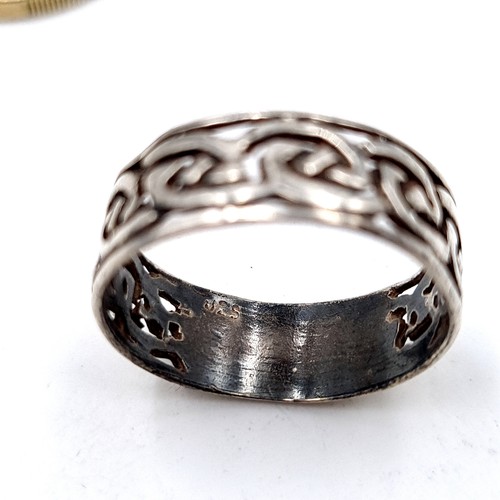 59 - Two Celtic designed sterling silver rings, ring sizes: R and T. Total weight: 6.05 grams.