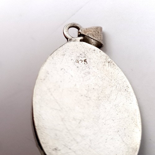 60 - Two sterling silver polished natural stone pendants, including an oval example (dimensions: 3.2cm, w... 