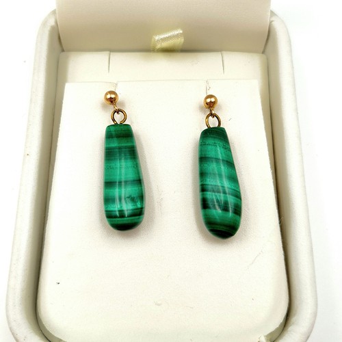 914 - A lovely pair of drop malachite earrings from Nicole Barr with 9 carat gold backs. Accompanied by pr... 