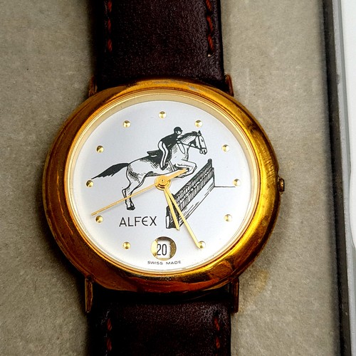 915 - A wrist watch from Alfex of Switzerland with a dial featuring a jumping horse, leather straps and go... 