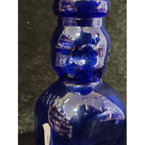 228 - A vintage one quart cobalt blue bottle reading 'Brookfield Baby Top' with a neck in the form of a ba... 