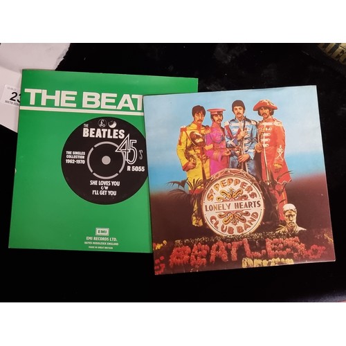 237 - A collection of 24 original The Beatles single records dating from 1962-70. With two bonus examples ... 