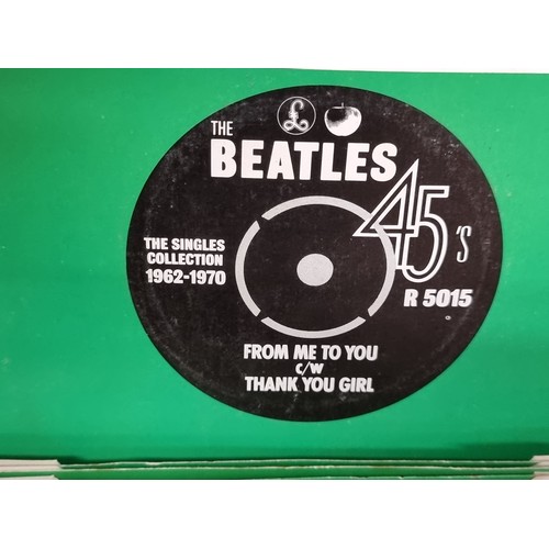 237 - A collection of 24 original The Beatles single records dating from 1962-70. With two bonus examples ... 