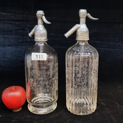 117 - Two vintage Irish soda syphons with beautiful etched detail to both. Two beautiful examples.