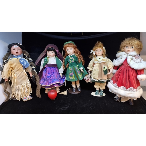 132 - A selection five adorable porcelain dolls including a young Irish dancer from the Emerald Collection... 